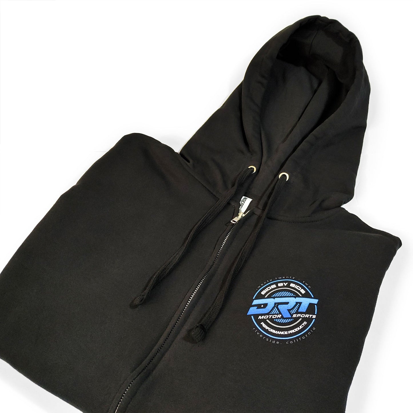 Folded hoodie with garment tag visible.