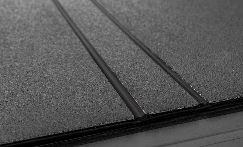 Access LOMAX Tri-Fold Cover Black Urethane - 07-13 Chevy Silverado 1500 5ft 8in Bed (Except Classic) B3020059